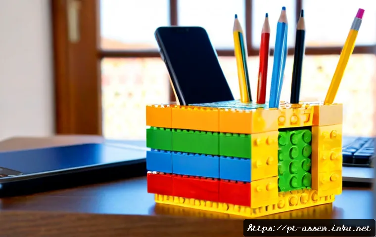 Home 17 레고로 제작한 실용적인 도구 - Photorealistic close-up of a practical brick-built desk organizer made from colorful interlocking to...